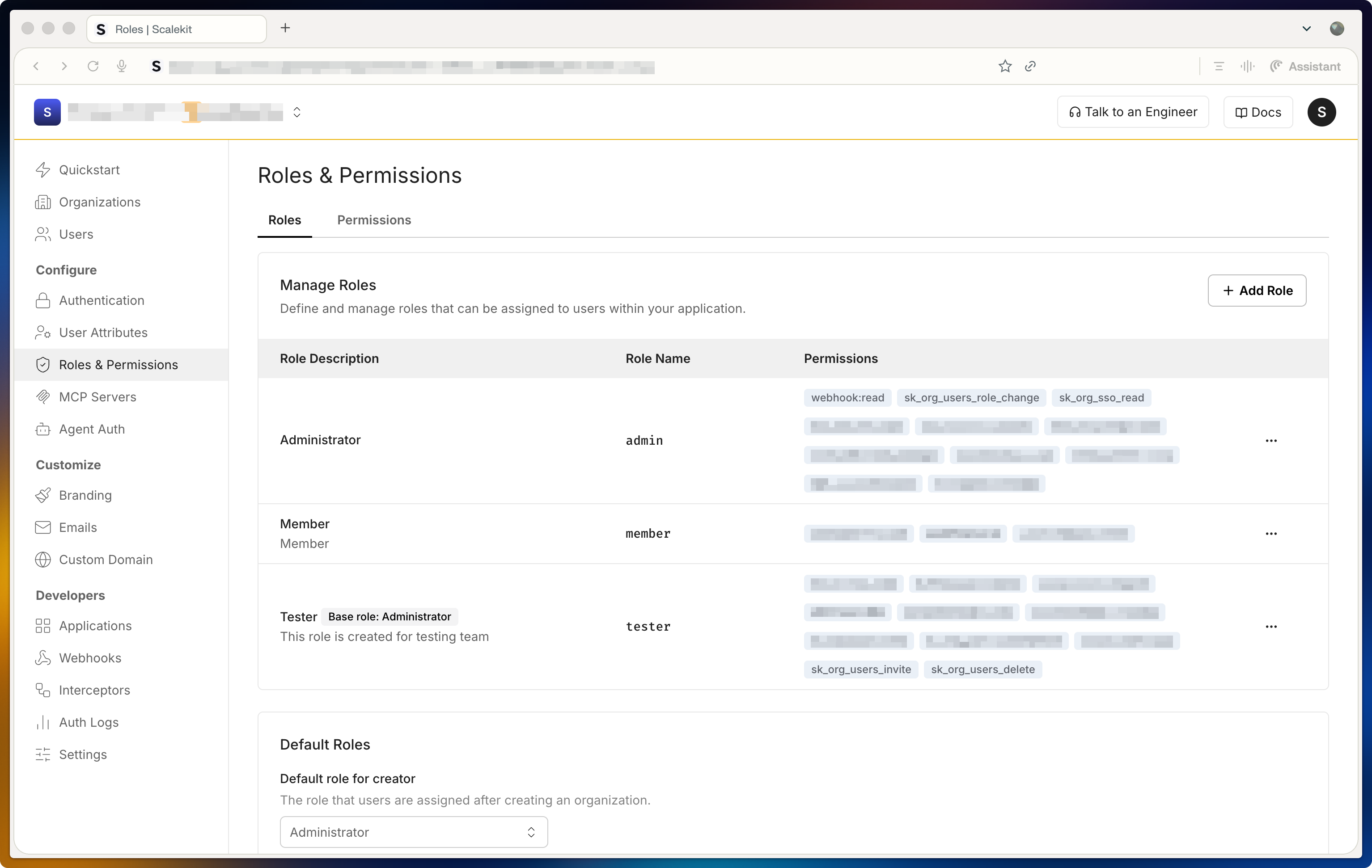Scalekit roles list showing default and custom roles